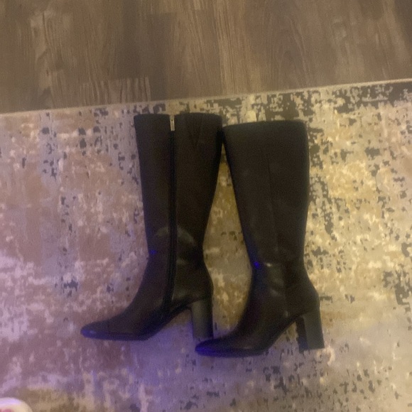 Brand new black boots. Perfect amt of heel. Very comfortable to walk in. - Picture 2 of 4